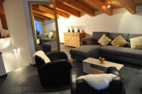 Гостиница Crap da Flem - 3.5 Zimmer Ferienwohnung am Sonnenhang von Flims  Флимс